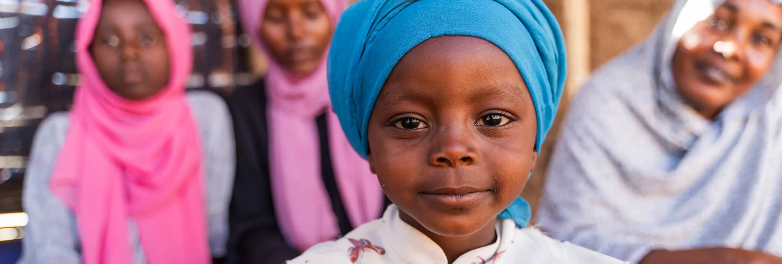 Chad_Sudanese-refugee-girl-with-family