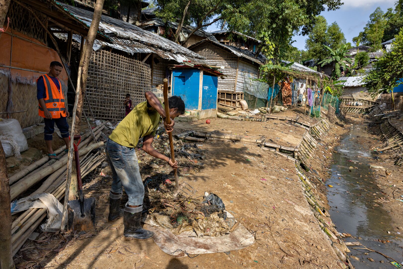 Bangladesh. UNHCR Youth, Mohammed Anower, And His Climate Group Clean Up A Stream