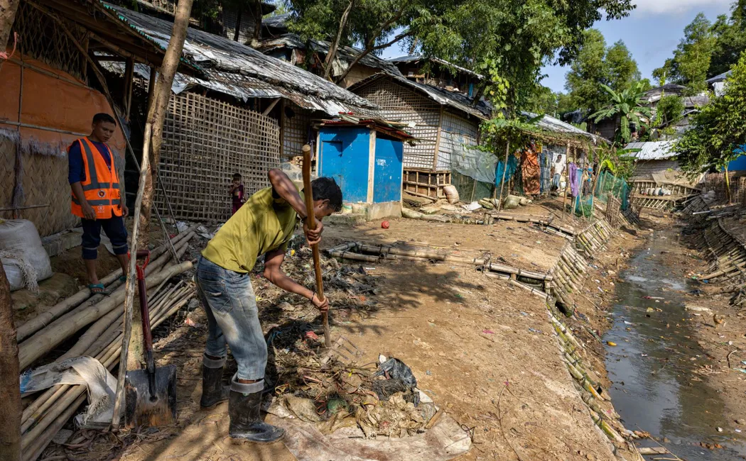 Bangladesh. UNHCR Youth, Mohammed Anower, And His Climate Group Clean Up A Stream